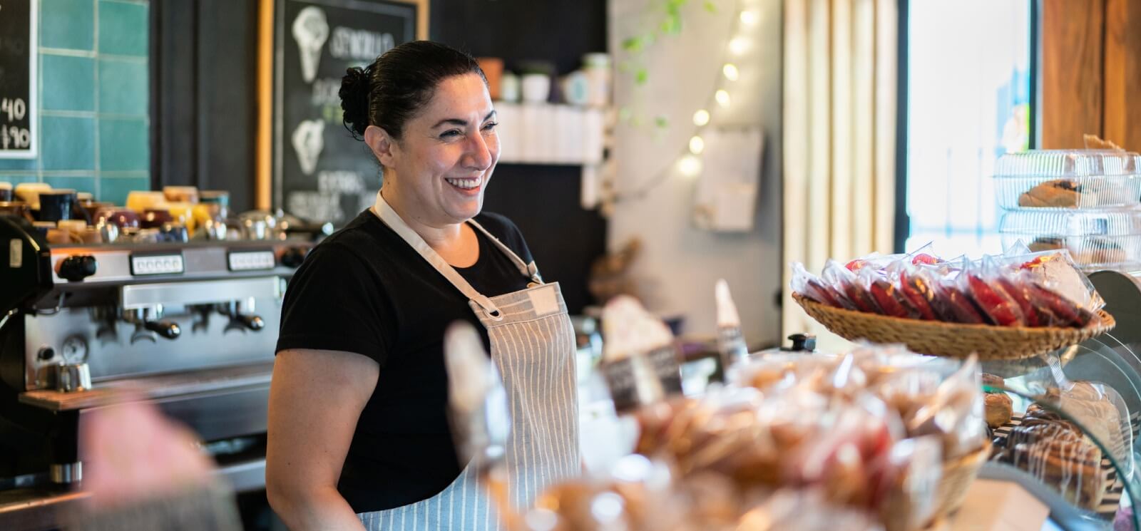 woman working in a cafe/bakery